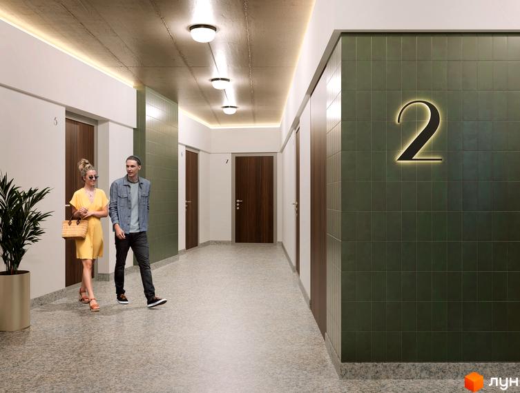 Сучасний коридор новобудови ЖК Слобідська з дверима та номером 