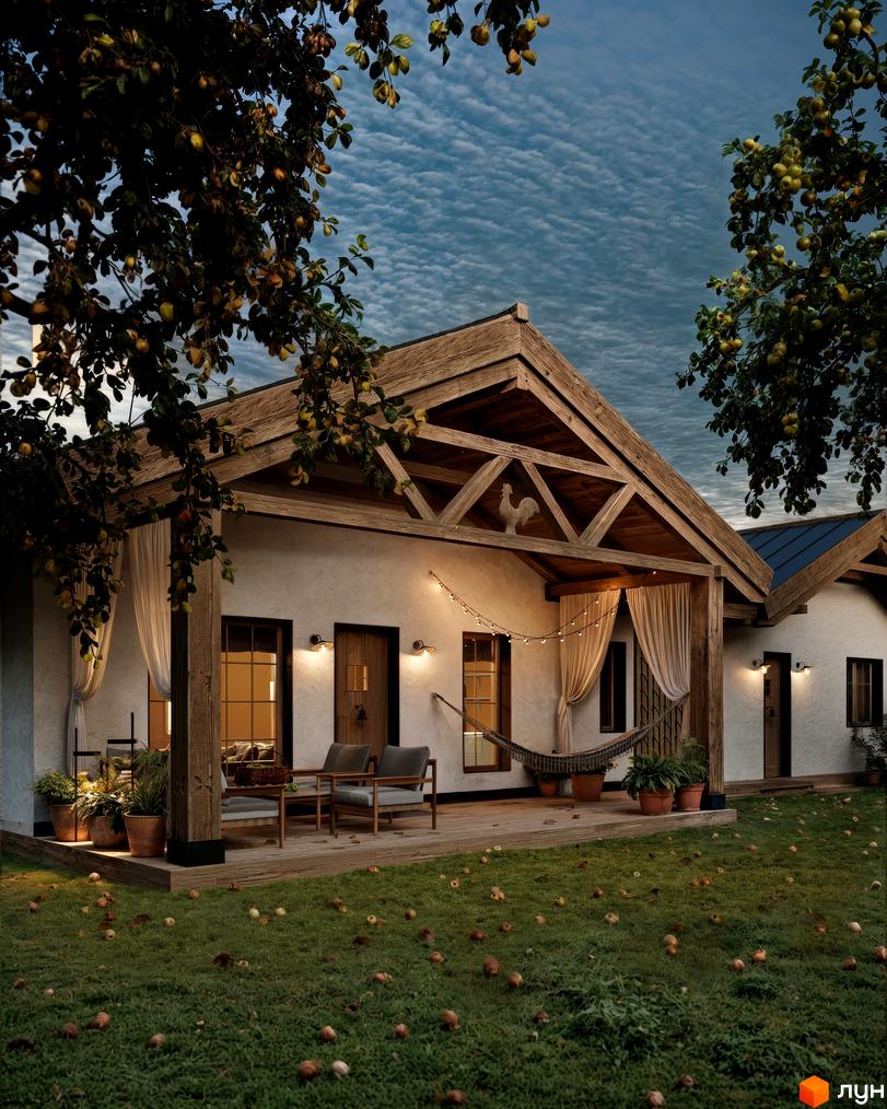 Котеджне містечко КМ ПАВЗА Village and Spa. Дерев'яні елементи фасаду, тераса з меблями та гамаком, яблука на траві.