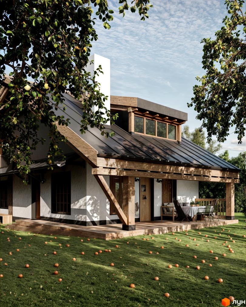 Котеджне містечко КМ ПАВЗА Village and Spa: двоповерховий будинок з темним дахом та дерев'яними елементами, оточений зеленню та плодами на траві.