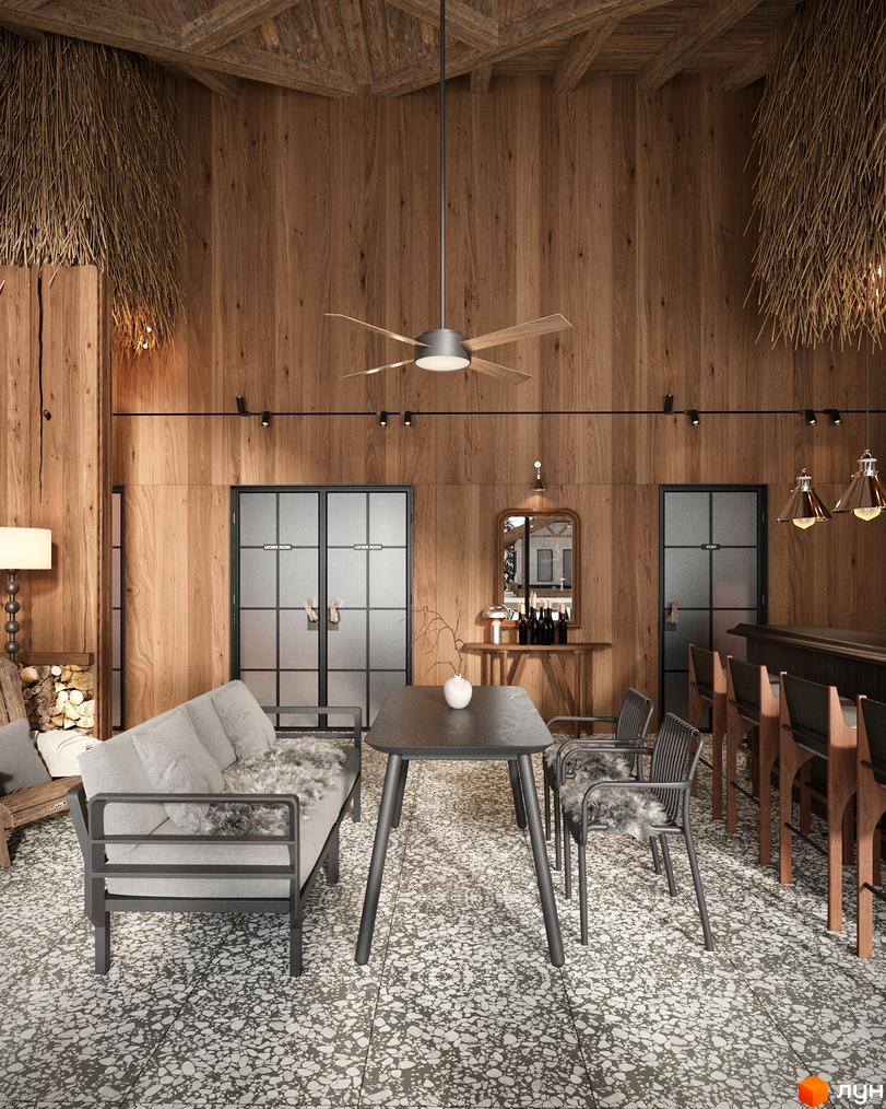 Інтер'єр затишного котеджного містечка КМ Павза Village and Spa з дерев'яними стінами, диваном та обіднім столом. Відкритий простір з барною стійкою та дверима до виходу.