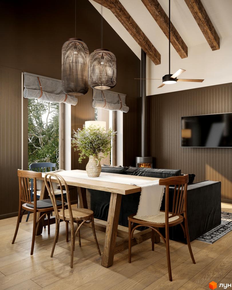 Інтер'єр вітальні з каміном та обідньою зоною в КМ ПАВЗА Village and Spa. Вікно з видом на зелень.