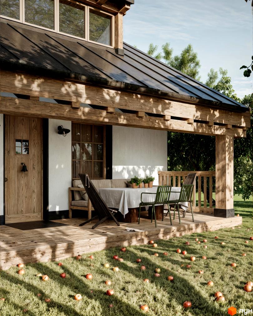 Котеджне містечко КМ ПАВЗА Village and Spa з дерев'яною верандою та зеленими стільцями, на газоні розкидані яблука.