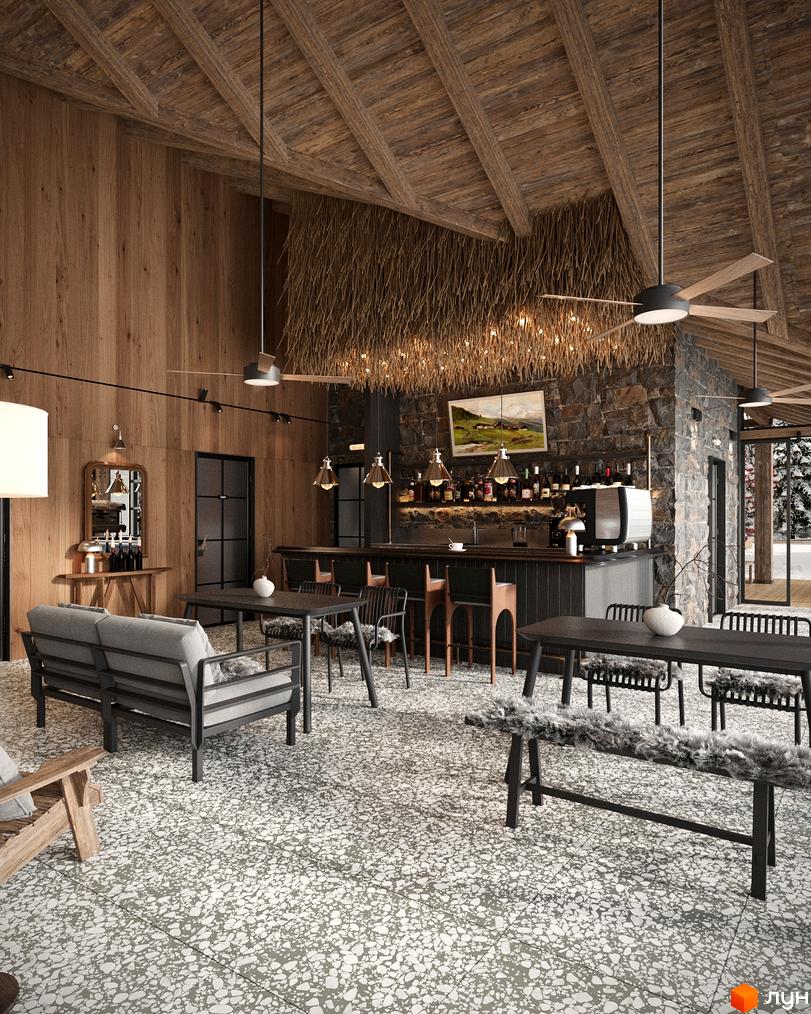 Інтер'єр кафе в стилі шале з дерев'яними балками та кам'яною стіною. Затишна зона відпочинку з диванами та столами.