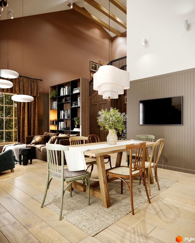 Інтер'єр їдальні в котеджному містечку КМ PAWZA Village and Spa з дерев'яним столом, стільцями та великою люстрою. Затишна зона відпочинку з диваном та книжковою шафою.