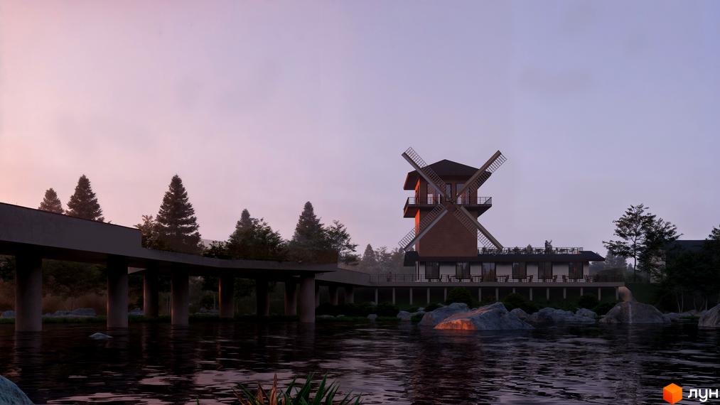 Котеджне містечко КМ ПАВЗА Village and Spa з оригінальною будівлею у вигляді млина та доглянутою прибудинковою територією біля води.