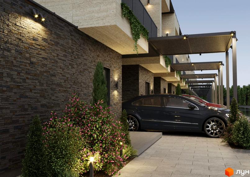 Зовнішній вигляд житлового комплексу на вул. Волошкова з фасадом з каменю та навісами для автомобілів. Прибудинкова територія з кущами та освітленням.