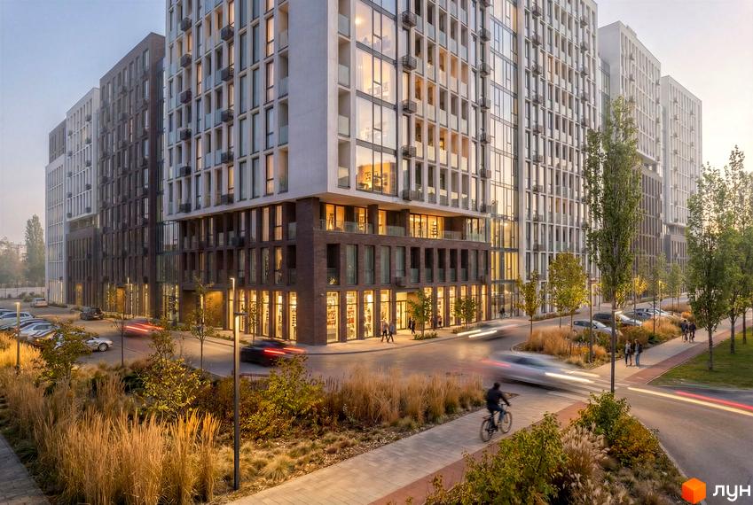 Житловий комплекс Nova City з фасадами з цегли та скла, з прибудинковою територією з деревами та зонами відпочинку.