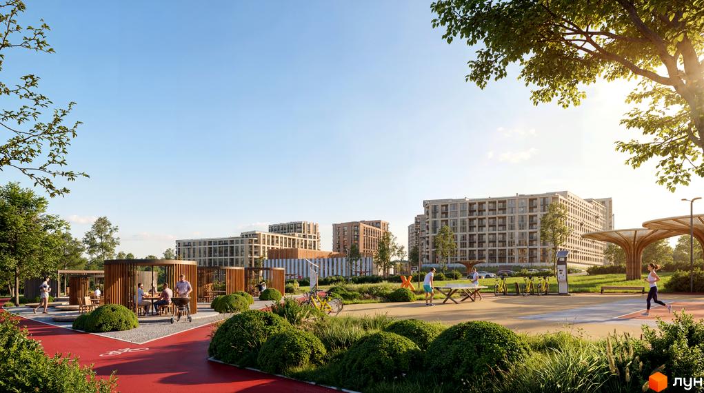 Житловий комплекс Uptown: сучасні багатоповерхові будинки та облаштована прибудинкова територія з зонами відпочинку та спортивними майданчиками.