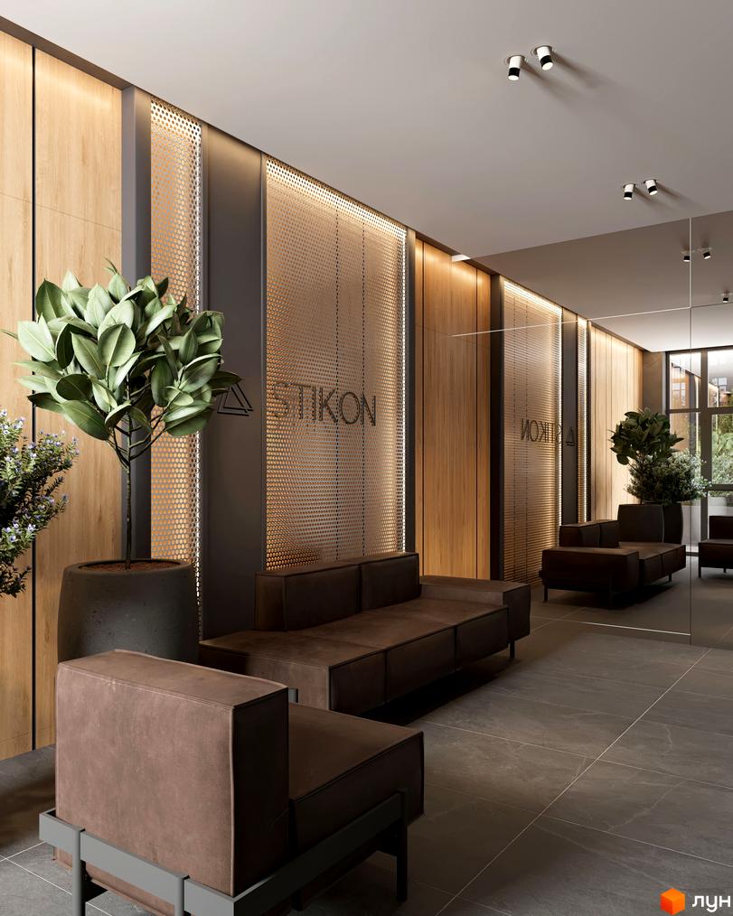 Лобі Житлового комплексу Real Park Nova з дерев'яними панелями, підсвіченими перфорованими стінами та м'якими коричневими диванами.
