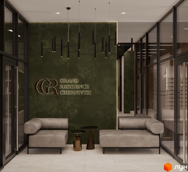 Лобі житлового комплексу Grand Residence Chernivtsi з диванами та столиками. Сучасна новобудова з елегантним дизайном.
