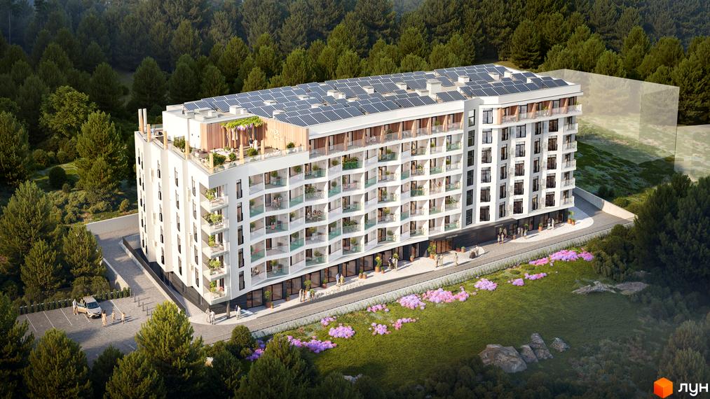 Житловий комплекс WOL. Home. Karpaty - це багатоповерхова біла будівля з балконами та сонячними панелями на даху, розташована серед дерев.
