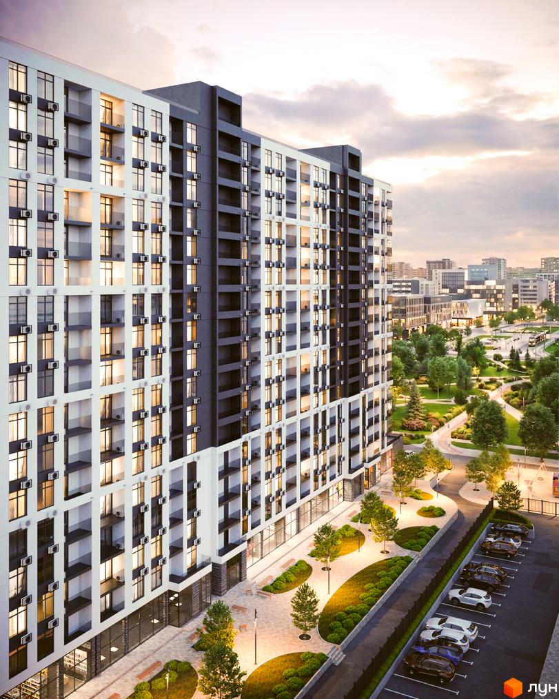 Житловий комплекс CITY PARK з біло-сірим фасадом та численними вікнами. Поруч розташовані зелені насадження, пішохідні доріжки та парковка.