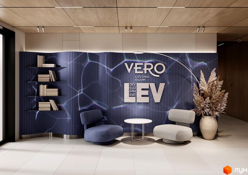 Інтер'єр лобі житлового комплексу VERO LIVING CLUB з диванами, столиком та декором. Сучасний дизайн стін та стелі.