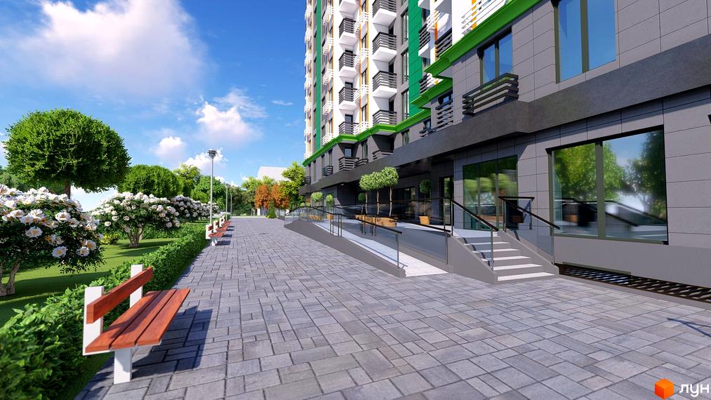 Зовнішній вигляд житлового комплексу Comfort City з фасадом сірого та зеленого кольорів, балконами та прибудинковою територією з лавками та деревами.