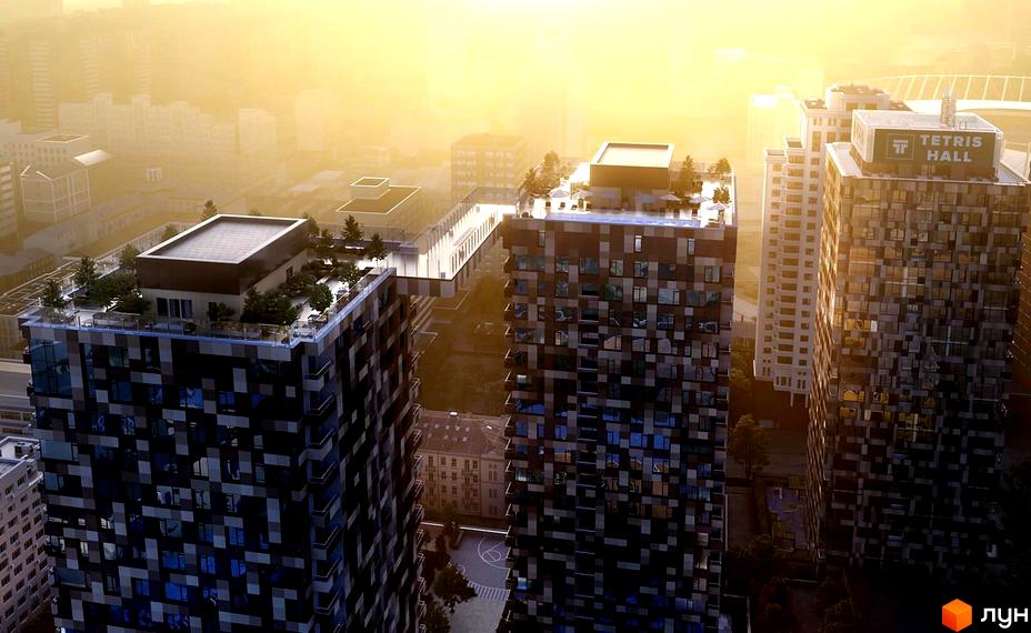 Житловий комплекс Tetris Hall - висотні будинки з геометричним фасадом та зеленими терасами на дахах. Навколо розташовані інші будівлі та міський ландшафт.