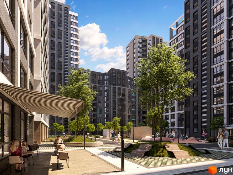 Kaskad Residence: багатоповерхові будинки з темними фасадами. Прибудинкова територія має зелені зони, місця для відпочинку та ігрові майданчики.