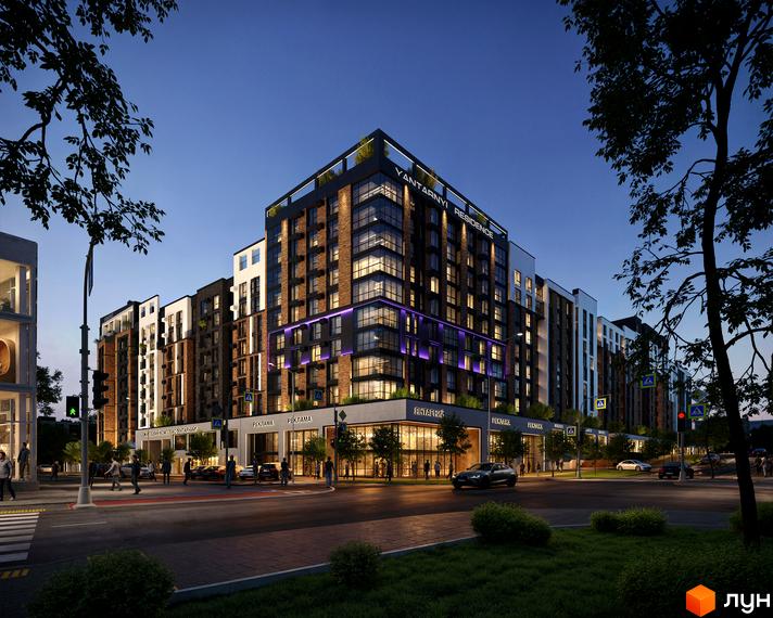 Житловий комплекс Янтарний Residence з цегляним фасадом та підсвіткою вночі. Навколо комплексу - зелена зона та дорога з пішохідним переходом.