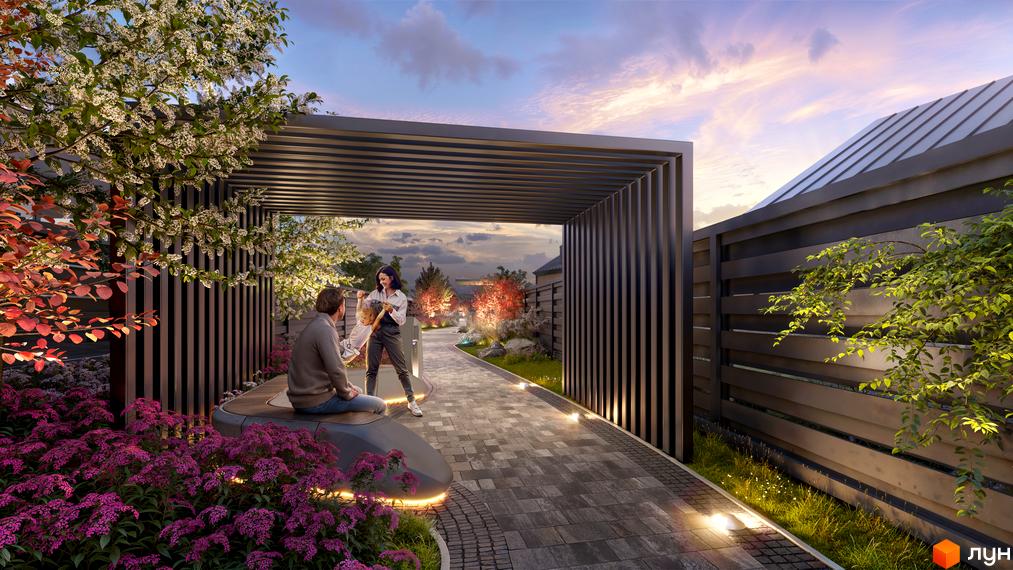 Котеджне містечко КМ Piemont eco village: екстер'єр будинку з перголою, ландшафтним дизайном та освітленням. Затишна зона відпочинку з людьми на території комплексу.