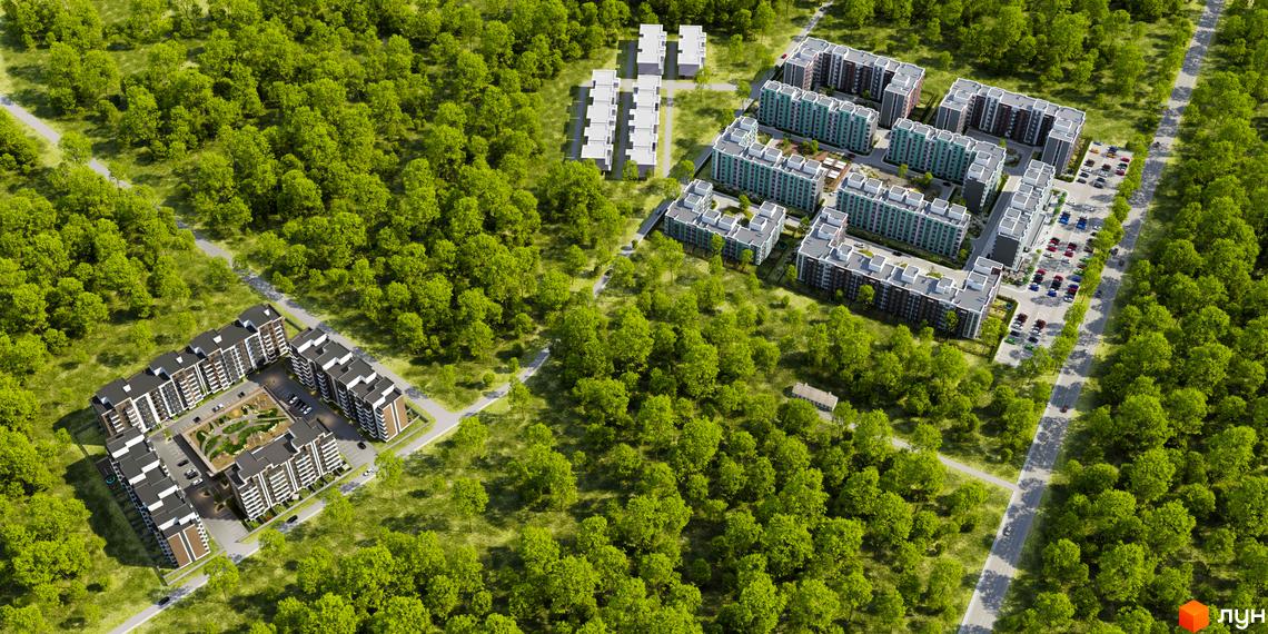 Аерофотознімок Житлового комплексу СКВЕР з багатоповерховими будинками серед лісу. На території є парковки та дитячі майданчики.