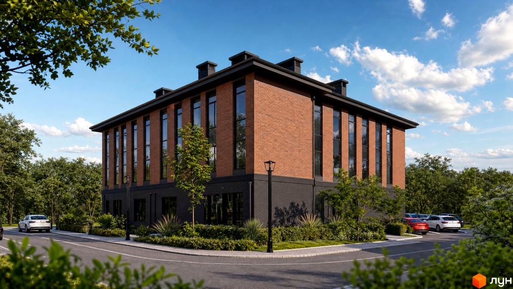Будинок ЖК Comfort Hall з червоної цегли та темним фасадом, оточений деревами та з парковкою поруч. Зовнішній вигляд будівлі та прибудинкова територія.