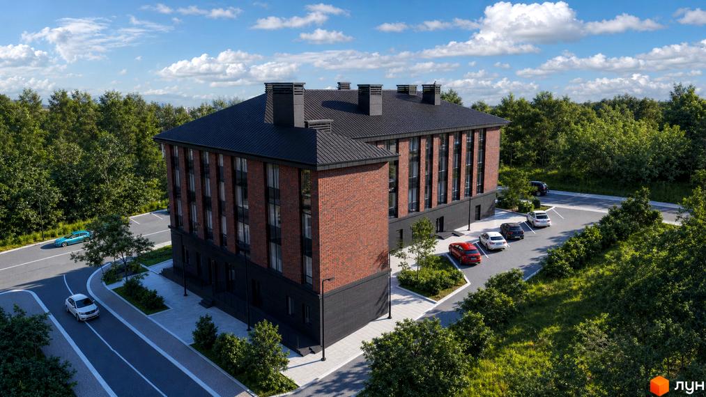 Житловий комплекс Comfort Hall з цегляним фасадом та чорним дахом, оточений деревами, з парковкою та дорогою.