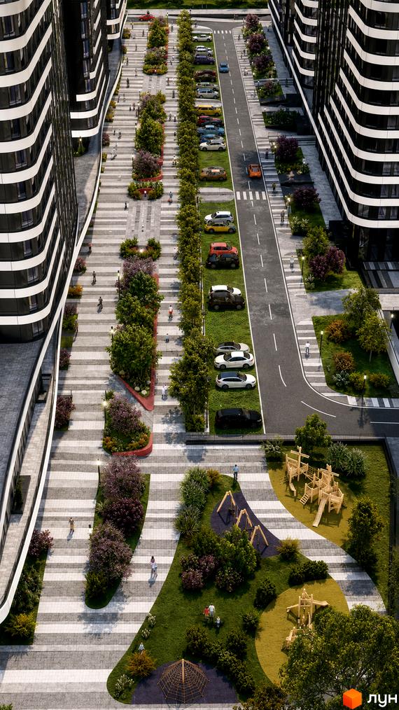 Зовнішній вигляд ЖК SvitLand Residences з чорно-білими фасадами та доглянутою прибудинковою територією з деревами та дитячим майданчиком.