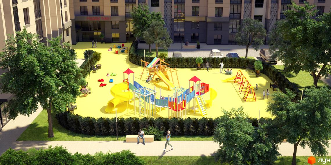 Житловий комплекс Барселона: дитячий майданчик з гірками та гойдалками на фоні багатоповерхових будинків. Територія комплексу озеленена деревами та кущами.