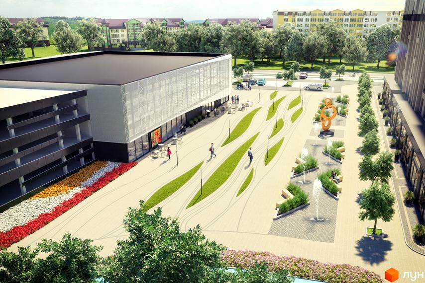 Сучасний житловий комплекс Барселона з багатою прибудинковою територією, що включає зелені зони, фонтани та місця для відпочинку.