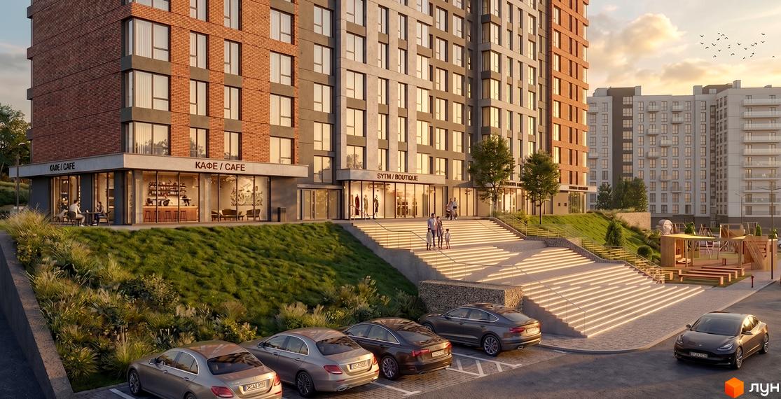 Житловий комплекс Tarnavsky з багатоповерховими будинками, цегляним та світлим фасадами. Перші поверхи займають комерційні приміщення, поруч – зелені схили, сходи та парковка.