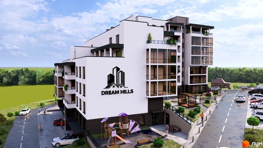 Житловий комплекс DREAM HILLS з білим фасадом та великими вікнами, оточений зеленню, з дитячим майданчиком та парковкою.