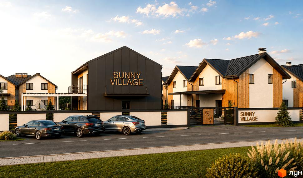 Котеджне містечко Sunny Village з будинками, що поєднують темні дахи, світлі стіни та дерев'яне оздоблення. На передньому плані видно дорогу, зелені насадження та автомобілі.