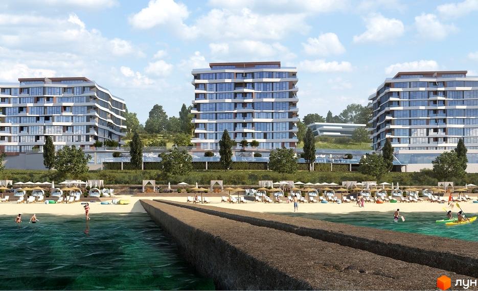 Житловий комплекс Costa Fontana з багатоповерховими будинками та пляжем з шезлонгами та парасольками. Комплекс розташований на березі моря.