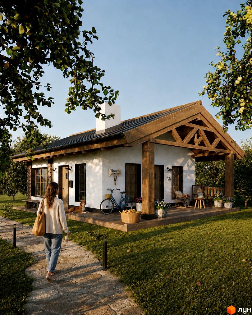 Котеджне містечко КМ ПАВЗА Village and Spa: затишний одноповерховий будинок з дерев'яною верандою та яблуневим садом. Прибудинкова територія з кам'яною доріжкою та зеленою травою.