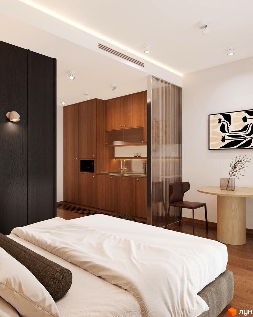 Oselia apartments: стильний інтер'єр спальні, суміщеної з кухнею, з дерев'яними елементами та арт-об'єктом на стіні.