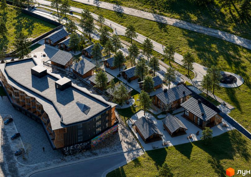 POVOLI Hotel має багатоповерхову будівлю з темним фасадом та дерев'яними елементами, оточену котеджами з деревини та зеленими насадженнями.