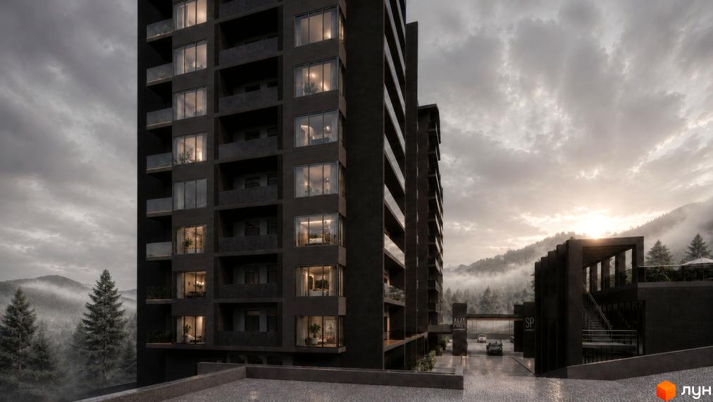 Багатоповерховий будинок AMA APARTMENTS з темним фасадом та великими вікнами на тлі туманних гір та хмарного неба.
