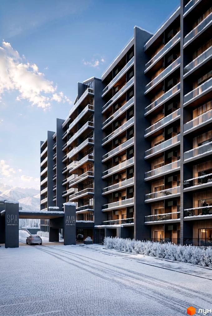AMA APARTMENTS - багатоповерховий будинок з балконами та скляними огорожами, розташований серед засніжених гір. Перед комплексом - засніжена дорога та кущі.