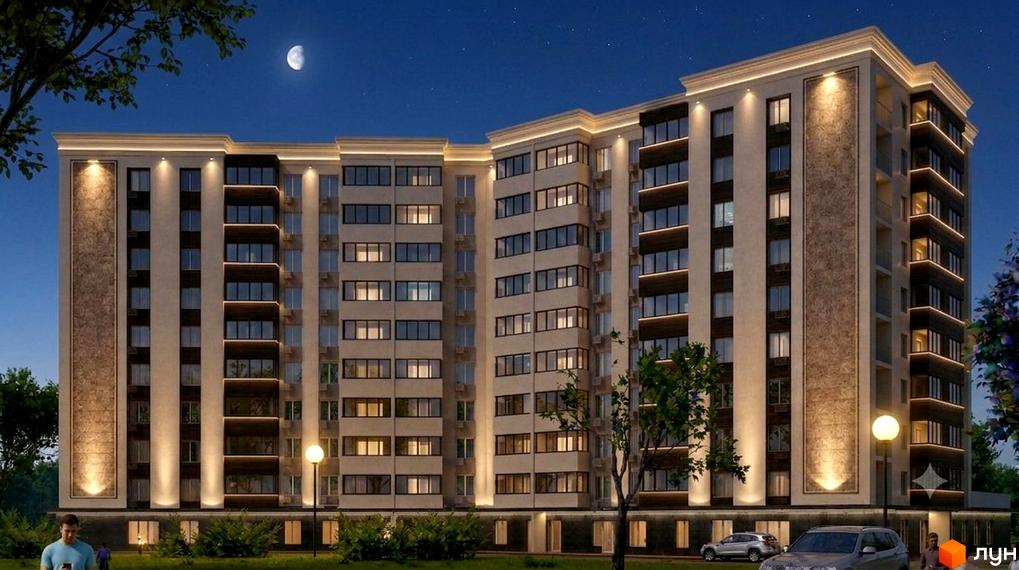 Житловий комплекс Сади Вишневі. Багатоквартирний будинок з підсвічуванням вночі, поруч дерева та автомобілі.