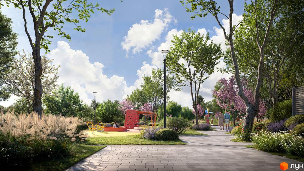 Дитячий майданчик та прогулянкові доріжки в Котеджному містечку ARTPARK. Територія з зеленими насадженнями та квітучими деревами.
