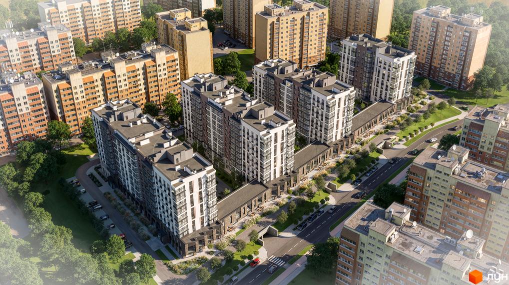 Аерофотографія Житлового комплексу AR/GO residence з багатоповерховими будинками білого та коричневого кольорів, оточеними зеленою територією та дорогами.