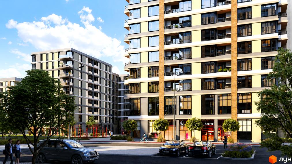 Житловий комплекс Krona Park II з жовто-сірими фасадами та балконами, поруч дитячий майданчик та парковка з автомобілями.