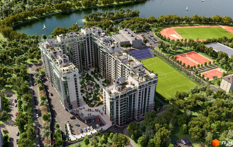 Житловий комплекс HydroPark DeLuxe: багатосекційна будівля зі світлим фасадом, зеленими терасами, розташована біля озера та спортивних майданчиків.