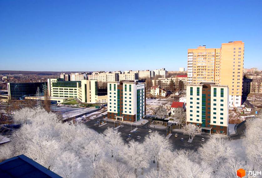 Зображення Новобудови Ізумрудне місто з висоти пташиного польоту. На фото будівлі та прибудинкова територія взимку.