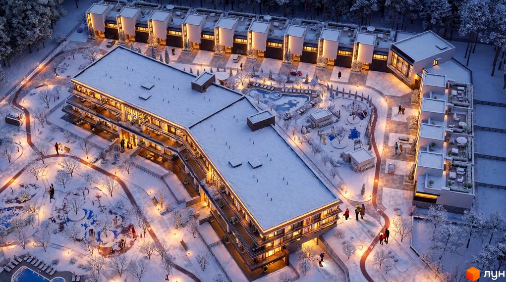 Таунхауси Lviv Resort: освітлені багатоповерхові будинки та ряд таунхаусів, вкриті снігом. Прибудинкова територія з доріжками, дитячим майданчиком та басейном.