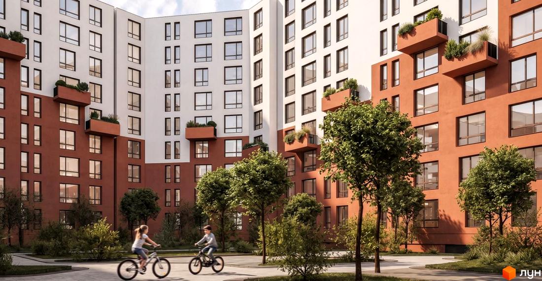 Житловий комплекс Millennium River Club з червоно-білими фасадами та зеленими насадженнями, діти катаються на велосипедах на прибудинковій території.