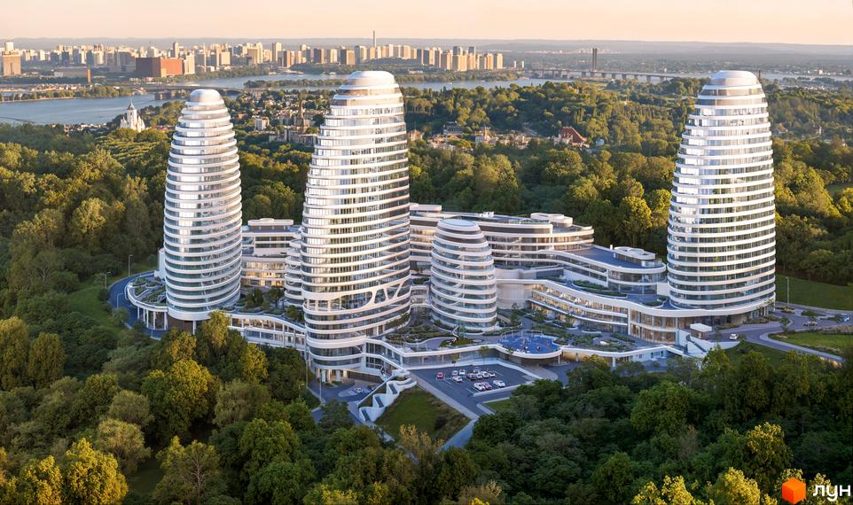 БФК INTERGAL CITY - житловий комплекс з футуристичними вежами та хвилястими будівлями, оточений зеленню, з містом на фоні. Прибудинкова територія включає паркінг та зони відпочинку.