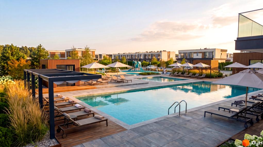 Котеджне містечко Montana City з басейном та зоною відпочинку. Сучасні будинки та зелена територія.