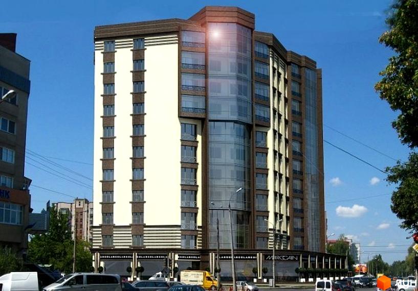 Зображення фасаду Житлового комплексу Атлант. Багатоповерхова будівля з панорамними вікнами та коричневим оздобленням.