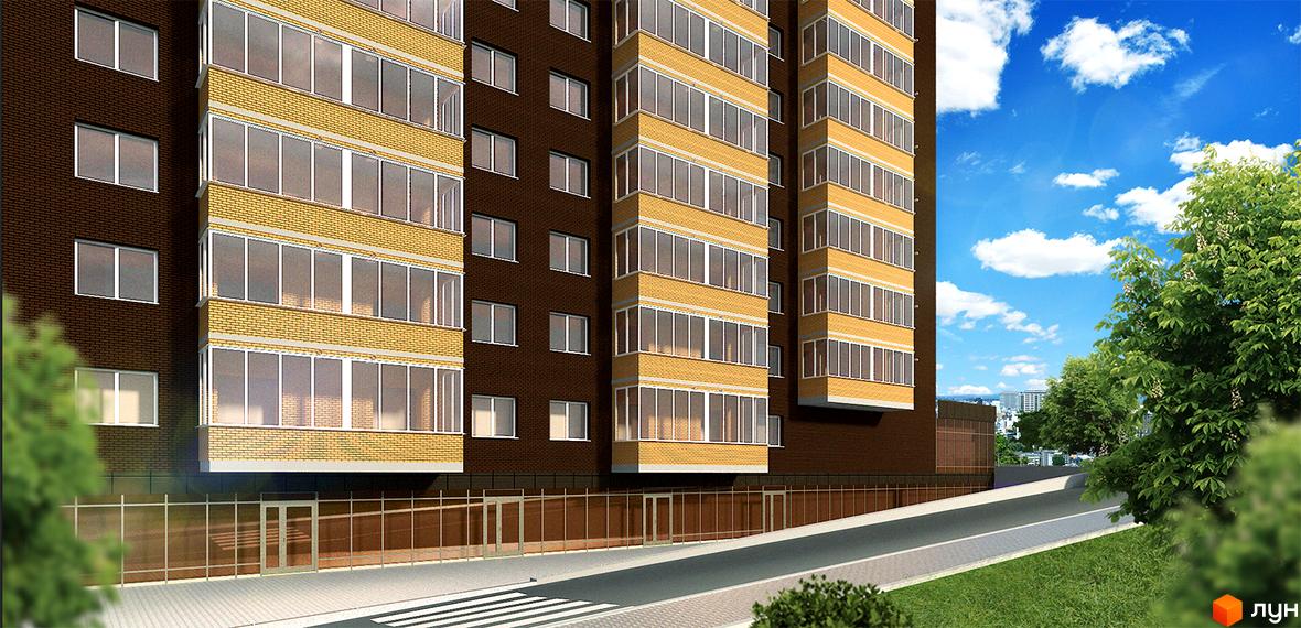 Житловий комплекс Шоколад: багатоповерховий будинок з коричневої цегли та жовтими балконами, перед яким дорога з пішохідним переходом та зелені дерева.