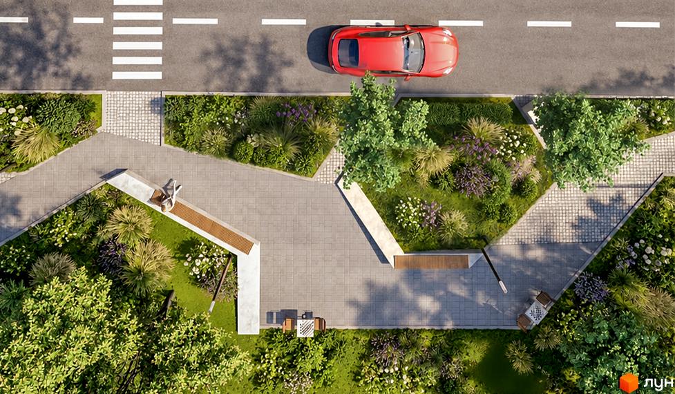 Прибудинкова територія житлового комплексу Family Plaza 2 з пішохідними алеями, лавками та зеленими насадженнями.